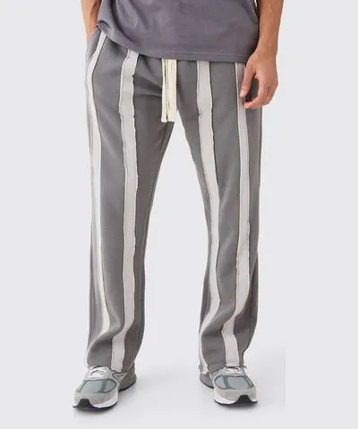 boohooMAN Mens Relaxed Cut & Sew Stripe Raw Edge Sweatpants